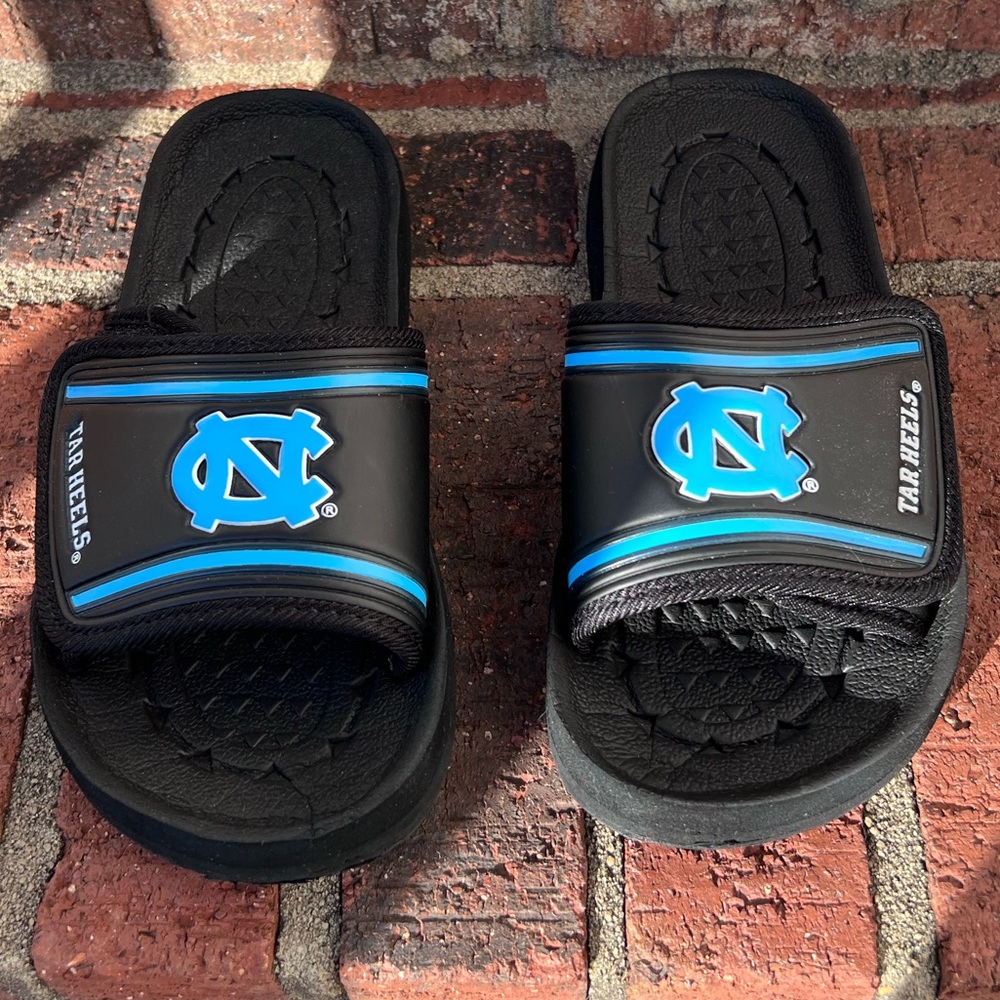 UNC slides with hook & loop closure. Approximately 9 inches long
